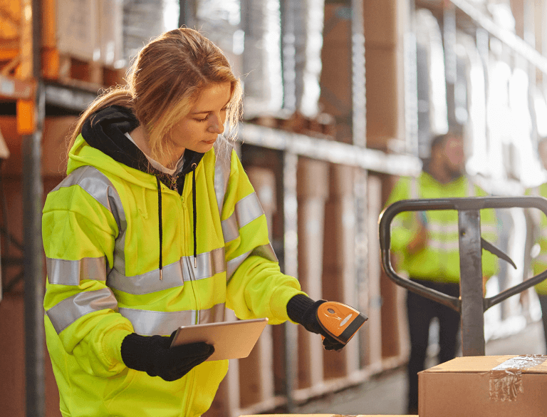 Photo of a person scanning a box